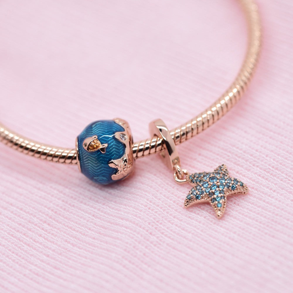 【Moments】Sparkling Starfish Dangle Charm 788942C01 Rose gold Stone blue Crystals